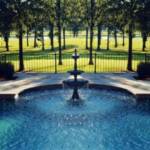 "A three-tiered fountain rises up in the center of the pool and adds a dramatic element to the backyard, which overlooks the golf course."